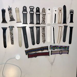 16 Apple Watch bands for series 5 40mm watch and charger.